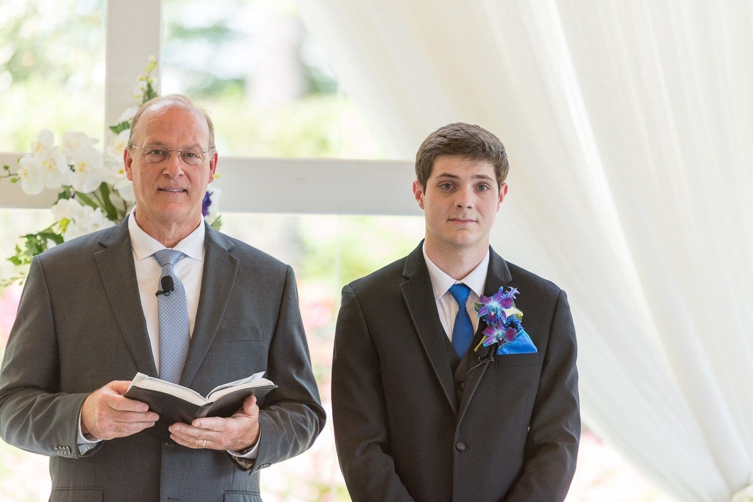 Atlanta Wedding Photographer FAQ - groom seeing bride for first time while she enters ceremony